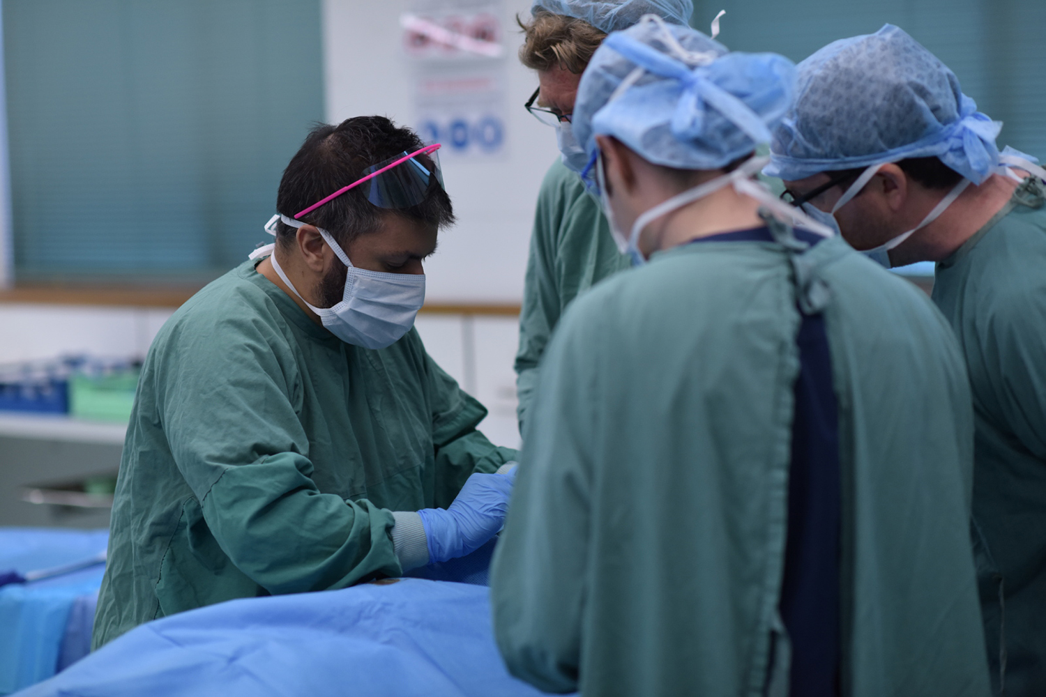Surgeons performing cosmetic surgery