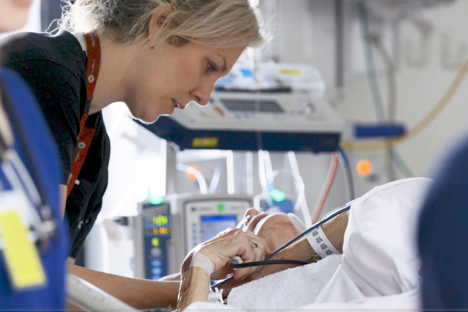 ICU nurse with patient