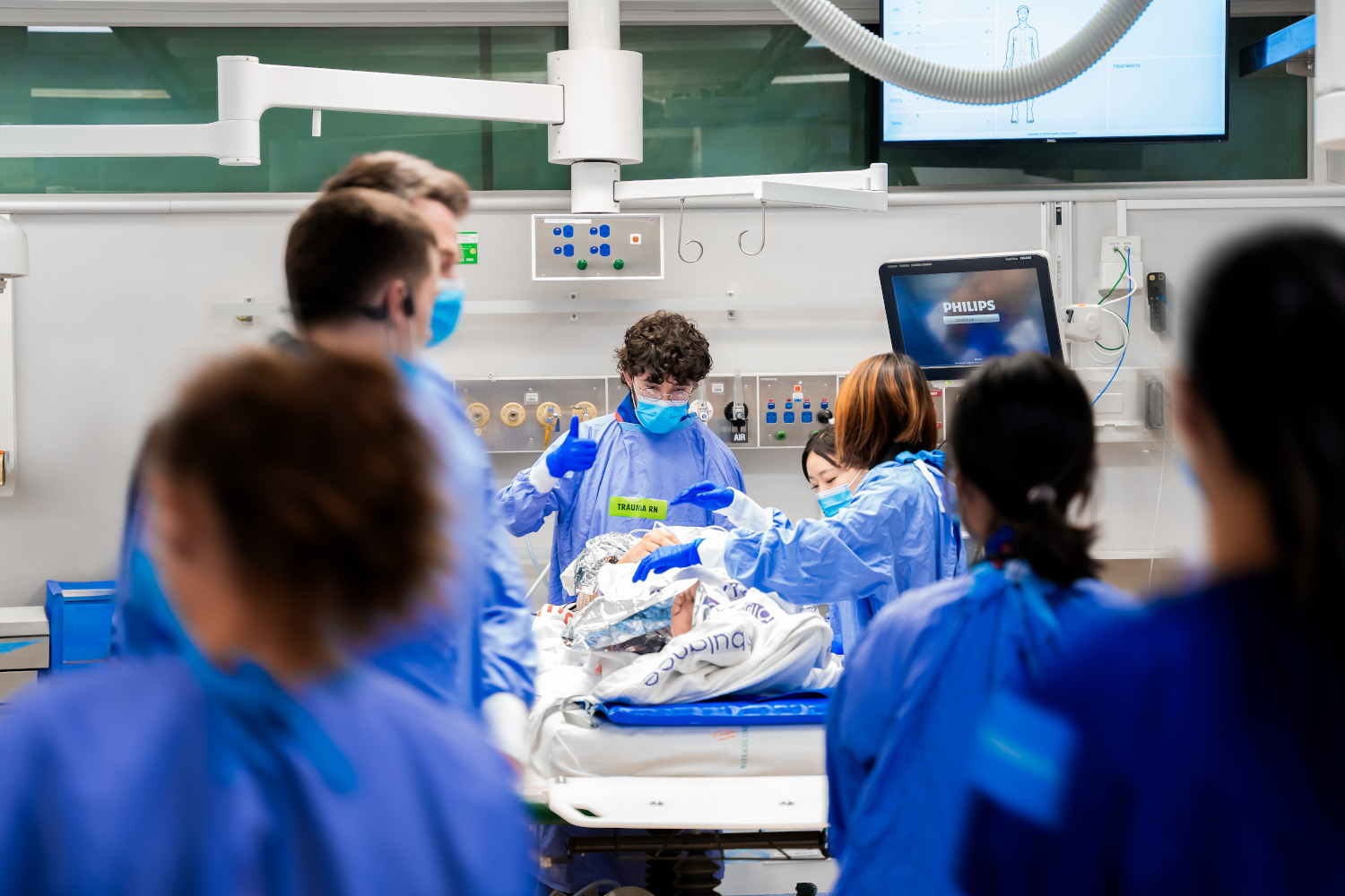 Surgeons and nursing staff in operating theatre