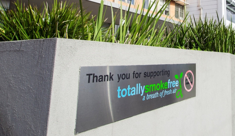 Sign outside the main entrance of The Alfred reading 'Thank you for supporting Totally Smokefree a breath of fresh air''