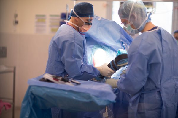 Surgeons performing an operation.