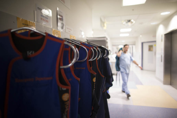 Lead-lined vests ready to protect radiology staff during tests and procedures.