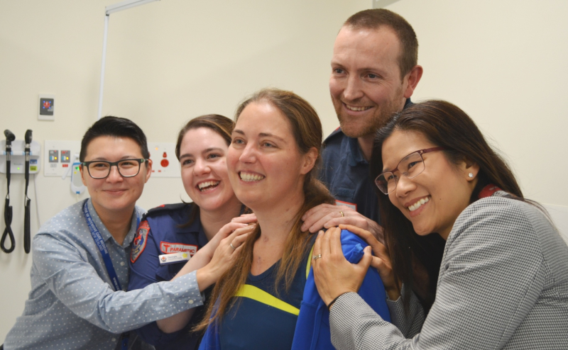 Petra Brosch with The Alfred doctors who saved her life, and Ambulance Victoria paramedics.