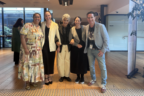 Elders, clinicians and community leaders standing together at The Alfred