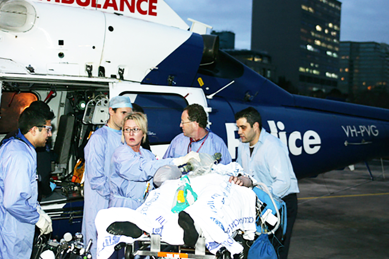 Patient being rushed to ED from helicopter