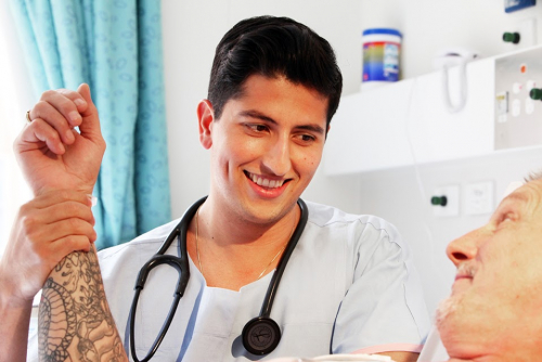 Staff caring for patient