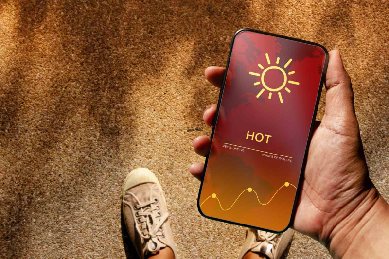 Iphone being held warning of heatwave
